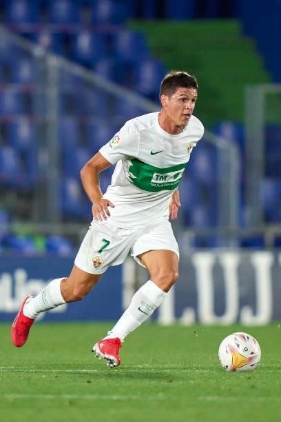 Guido Carrillo of Elche CF runs with the ball during the La Liga Santander match between Getafe CF and Elche CF at Coliseum Alfonso Perez on...