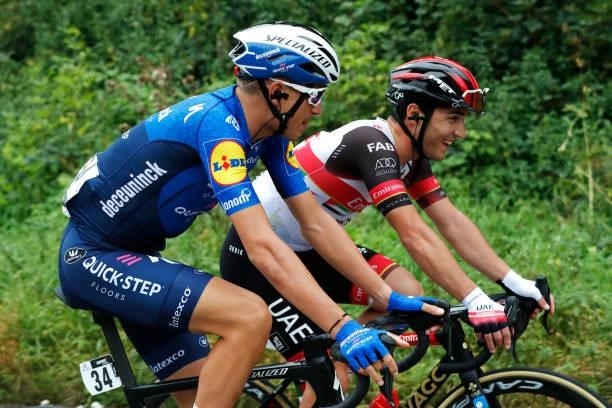 Fausto Masnada of Italy and Team Deceuninck - Quick-Step and Valerio Conti of Italy and UAE Team Emirates compete during the 81st Skoda-Tour De...