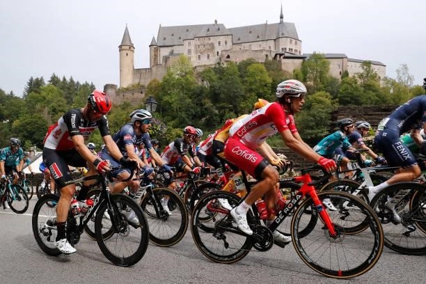 Roger Kluge of Germany and Team Lotto Soudal, José Herrada Lopez of Spain and Team Cofidis and The Peloton passing in front of the Vianden Castle in...