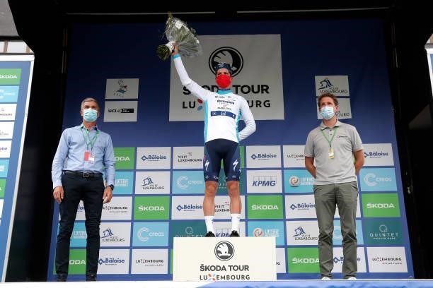 João Almeida of Portugal and Team Deceuninck - Quick-Step celebrates winning the white best young rider jersey on the podium ceremony after the 81st...