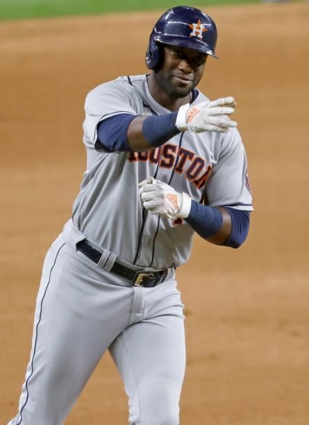 Yordan Alvarez of the Houston Astros runs the bases after hitting a solo home run against the Texas Rangers during the seventh inning at Globe Life...
