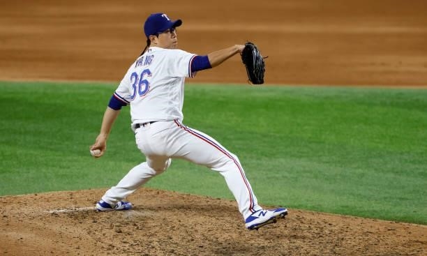 Hyeon-Jong Yang of the Texas Rangers pitches against the Houston Astros during the sixth inning at Globe Life Field on September 13, 2021 in...