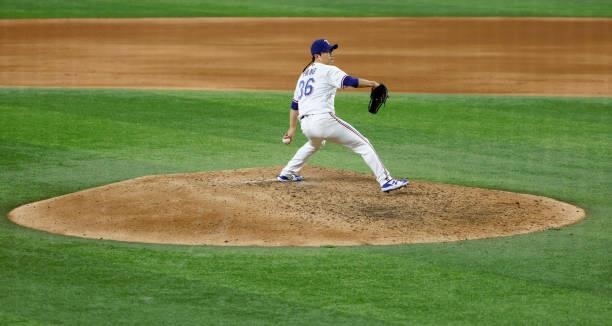 Hyeon-Jong Yang of the Texas Rangers pitches against the Houston Astros during the sixth inning at Globe Life Field on September 13, 2021 in...