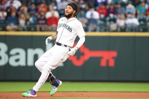 Crawford of the Seattle Mariners reaches second base safely after a leadoff double against the Boston Red Sox in the first inning at T-Mobile Park on...
