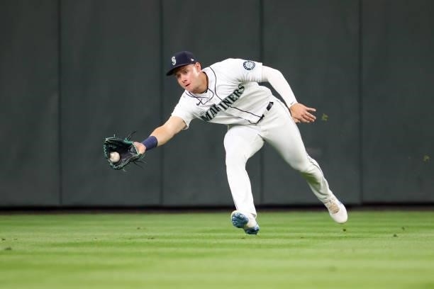 Jarred Kelenic of the Seattle Mariners makes a catch off the bat of Alex Verdugo of the Boston Red Sox during the second inning at T-Mobile Park on...