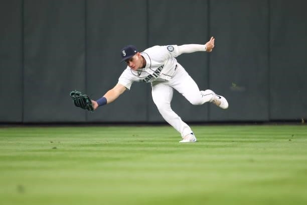 Jarred Kelenic of the Seattle Mariners makes a catch off the bat of Alex Verdugo of the Boston Red Sox during the second inning at T-Mobile Park on...
