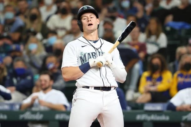 Jarred Kelenic of the Seattle Mariners reacts after striking out while looking against the Boston Red Sox in the second inning at T-Mobile Park on...