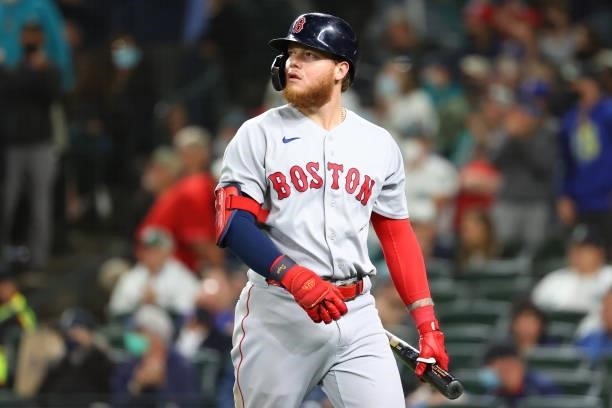 Alex Verdugo of the Boston Red Sox reacts after striking out while swinging against the Seattle Mariners during the ninth inning at T-Mobile Park on...