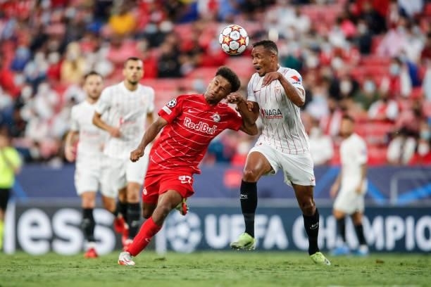 Karim Adeyemi of FC Salzburg challenged by Diego Carlos of FC Sevilla during the UEFA Champions League group G match between Sevilla FC and RB...
