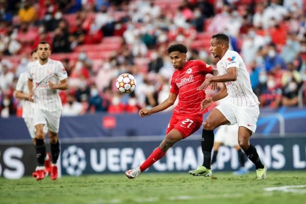 Karim Adeyemi of FC Salzburg challenged by Diego Carlos of FC Sevilla during the UEFA Champions League group G match between Sevilla FC and RB...