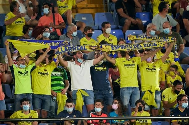 Villarreal fans hold up scarves prior to the UEFA Champions League group F match between Villarreal CF and Atalanta at Estadio de la Ceramica on...