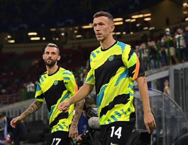 Ivan Perisic and Marcelo Brozovic of FC Internazionale run onto the pitch before the UEFA Champions League group D match between Inter and Real...