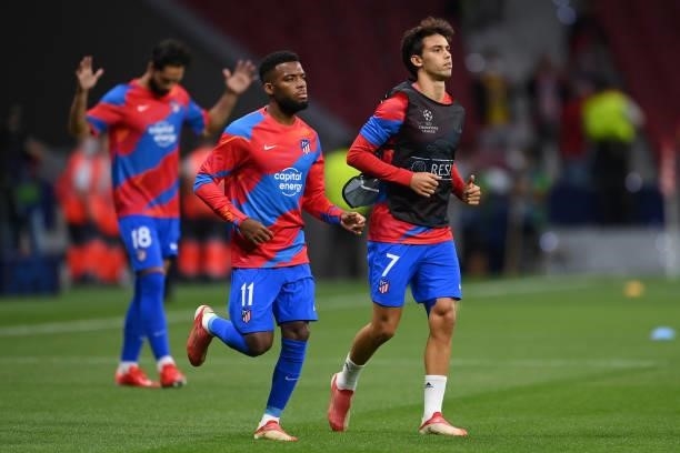 Thomas Lemar and Joao Felix of Atletico Madrid warm up prior to the UEFA Champions League group B match between Atletico Madrid and FC Porto at Wanda...