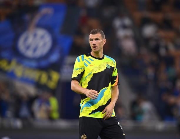 Edin Dzeko of FC Internazionale warms up ahead of the UEFA Champions League group D match between Inter and Real Madrid at Giuseppe Meazza Stadium on...