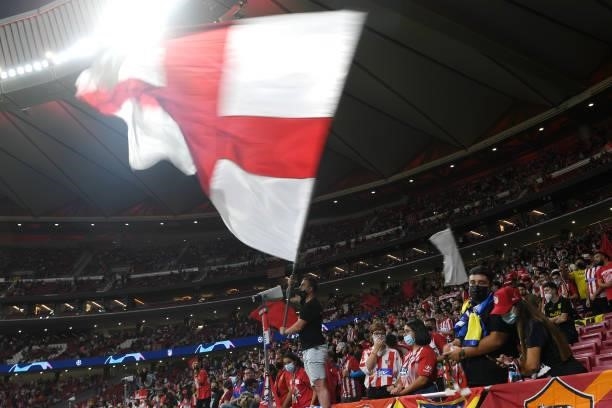 General view inside the stadium as a fan waves an England flag prior to the UEFA Champions League group B match between Atletico Madrid and FC Porto...