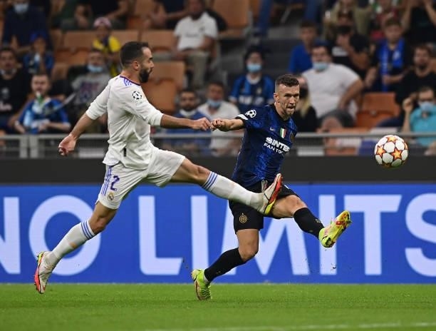 Ivan Perisic of FC Internazionale competes for the ball with Dani Carvajal of Real Madrid during the UEFA Champions League group D match between...