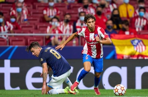 Joao Felix of Atletico Madrid runs with the ball during the UEFA Champions League group B match between Atletico Madrid and FC Porto at Wanda...