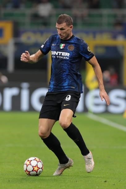 Edin Dzeko of FC Internazionale in action during the UEFA Champions League group D match between Inter and Real Madrid at Giuseppe Meazza Stadium on...