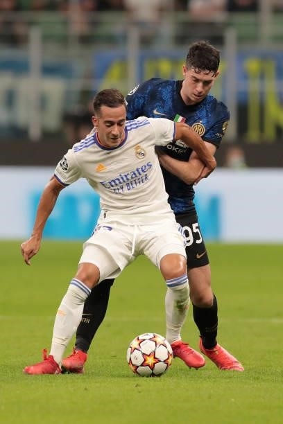 Alessandro Bastoni of FC Internazionale is challenged by Lucas Vázquez of Real Madrid during the UEFA Champions League group D match between Inter...