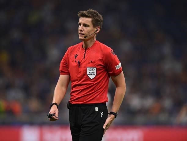The referee looks on during the UEFA Champions League group D match between Inter and Real Madrid at Giuseppe Meazza Stadium on September 15, 2021 in...