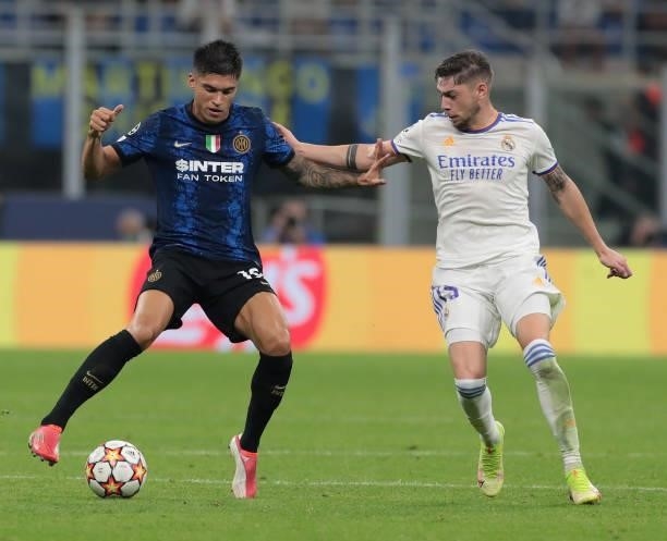 Joaquín Correa of FC Internazionale is challenged by Federico Valverde of Real Madrid during the UEFA Champions League group D match between Inter...