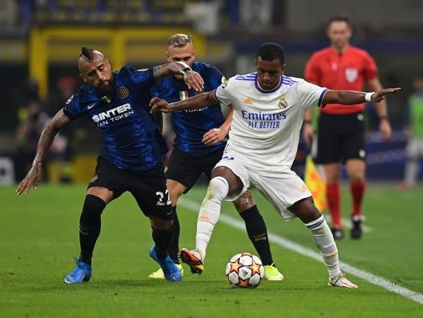 Arturo Vidal of FC Internazionale competes for the ball with Rodrygo of Real Madrid during the UEFA Champions League group D match between Inter and...