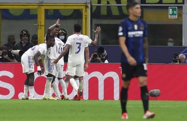 Rodrygo Real Madrid celebrates with his team-mates after scoring the opening goal during the UEFA Champions League group D match between Inter and...