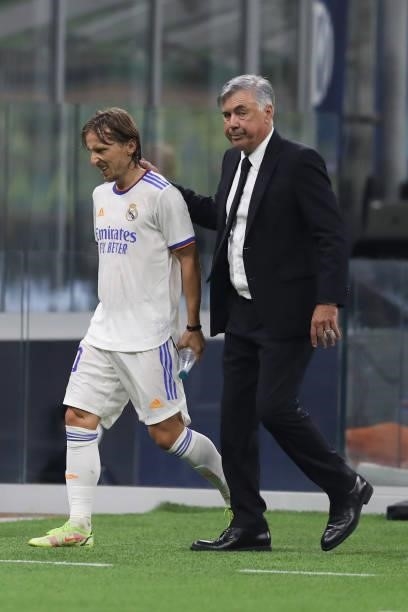 Luka Modric of Real Madrid reacts along with Head coach Carlo Ancelotti as he is substituted during the UEFA Champions League group D match between...