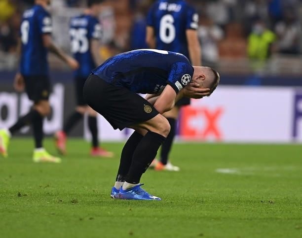 Milan Skriniar of FC Internazionale reacts at the end of the UEFA Champions League group D match between Inter and Real Madrid at Giuseppe Meazza...