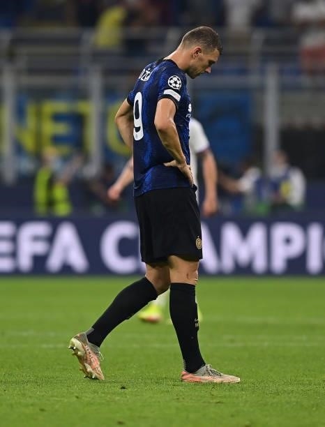 Edin Dzeko of FC Internazionale reacts at the end of the UEFA Champions League group D match between Inter and Real Madrid at Giuseppe Meazza Stadium...
