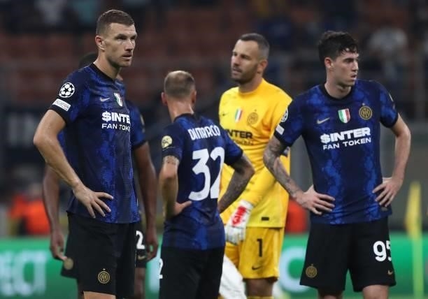 Edin Dzeko of FC Internazionale shows his dejection at the end of the UEFA Champions League group D match between Inter and Real Madrid at Giuseppe...