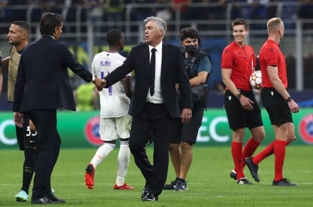Internazionale coach Simone Inzaghi shakes hands with Real Madrid coach Carlo Ancelotti at the end of the UEFA Champions League group D match between...