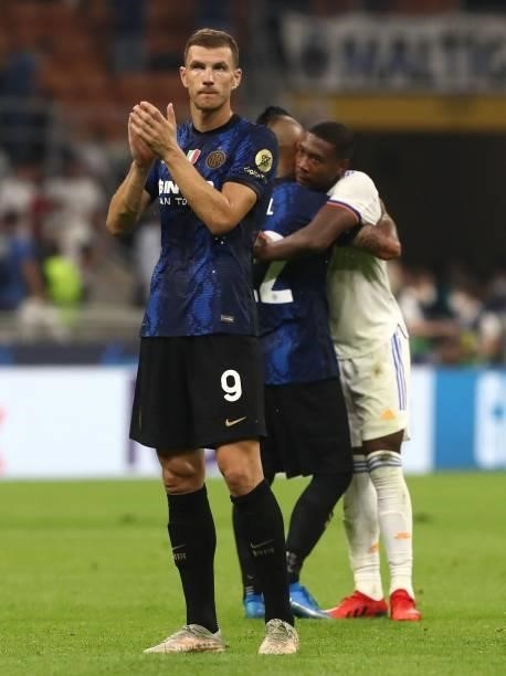 Edin Dzeko of FC Internazionale shows his dejection at the end of the UEFA Champions League group D match between Inter and Real Madrid at Giuseppe...