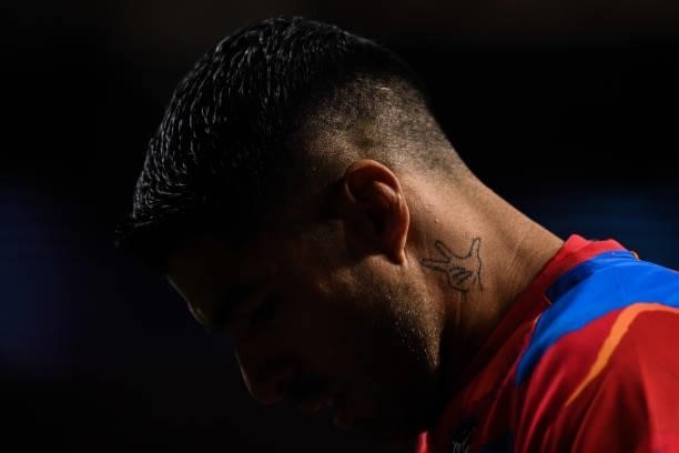 Luis Suarez of FC Barcelona looks on during the warm up prior to the UEFA Champions League group B match between Atletico Madrid and FC Porto at...
