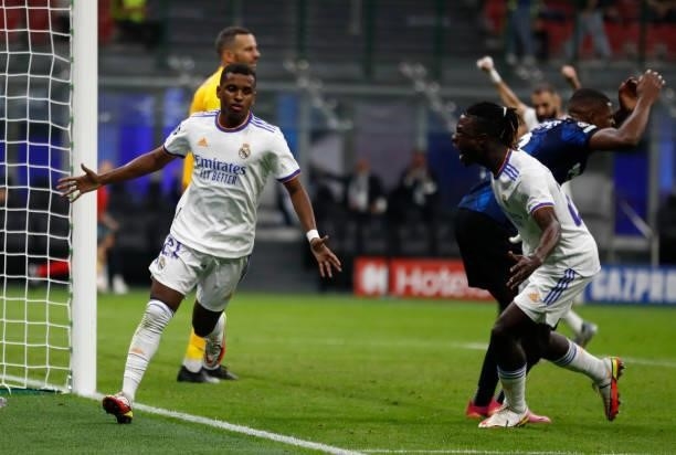Rodrygo Goes and Eduardo Camavinga of Real Madrid celebrate a goal during the UEFA Champions League group D match between Inter and Real Madrid at...
