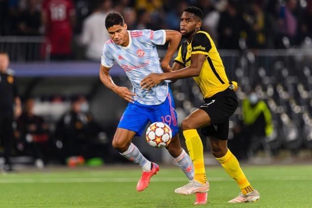 Jordan Siebatcheu of Young Boys fights for the ball with Raphael Varane of Manchester United during the UEFA Champions League group F match between...