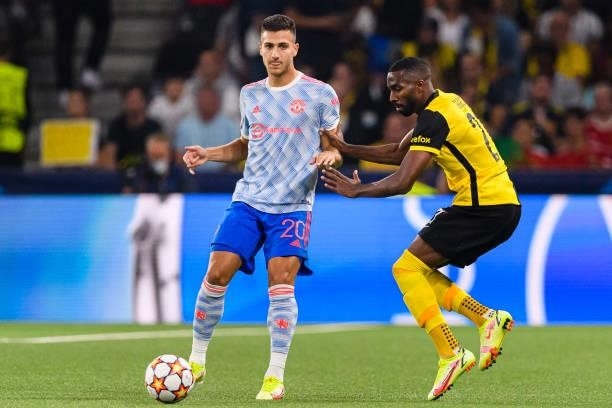 Diogo Dalot of Manchester United is chased by Ulisses Garcia of Young Boys during the UEFA Champions League group F match between BSC Young Boys and...