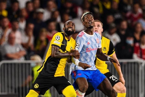 Nicolas Moumi of Young Boys fights for the ball with Paul Pogba of Manchester United during the UEFA Champions League group F match between BSC Young...