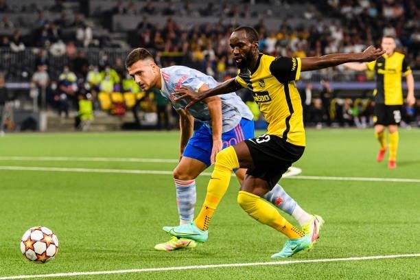 Nicolas Moumi of Young Boys plays against Diogo Dalot of Manchester United during the UEFA Champions League group F match between BSC Young Boys and...
