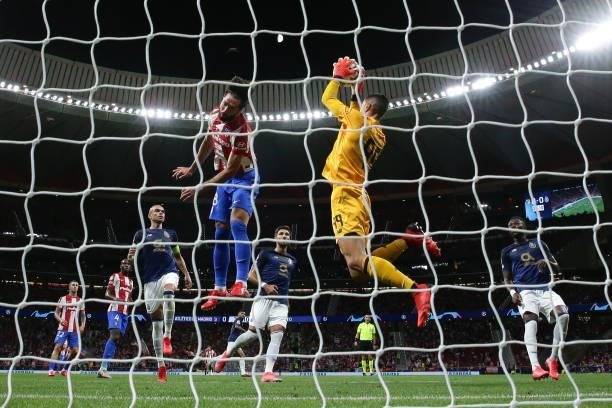 Goalkeeper Diogo Costa of FC Porto stops the attack of Felipe Almeida of Atletico de Madrid during the UEFA Champions League group B match between...