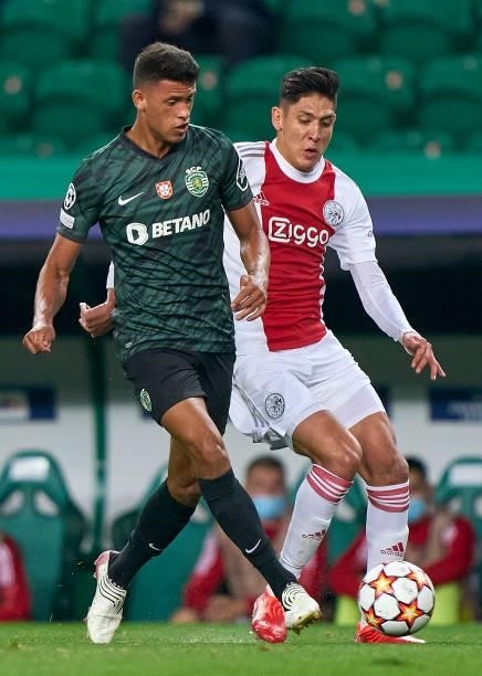Matheus Nunes of Sporting CP is challenged by Edson Alvarez of Ajax during the UEFA Champions League group C match between Sporting CP and AFC Ajax...