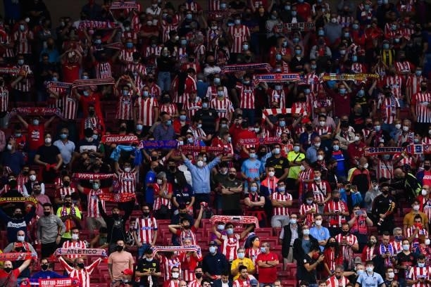 Atletico de Madrid fans cheer on prior to the UEFA Champions League group B match between Atletico Madrid and FC Porto at Wanda Metropolitano on...
