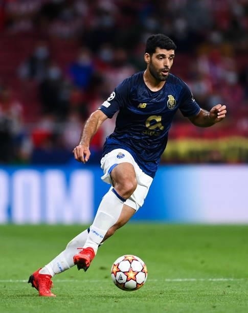 Mehdi Taremi of FC Porto runs with the ball during the UEFA Champions League group B match between Atletico Madrid and FC Porto at Wanda...