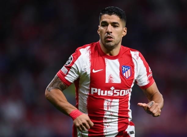 Luis Suarez of Atletico de Madrid runs with the ball during the UEFA Champions League group B match between Atletico Madrid and FC Porto at Wanda...