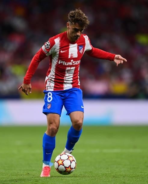 Antoine Griezmann of Atletico de Madrid runs with the ball during the UEFA Champions League group B match between Atletico Madrid and FC Porto at...