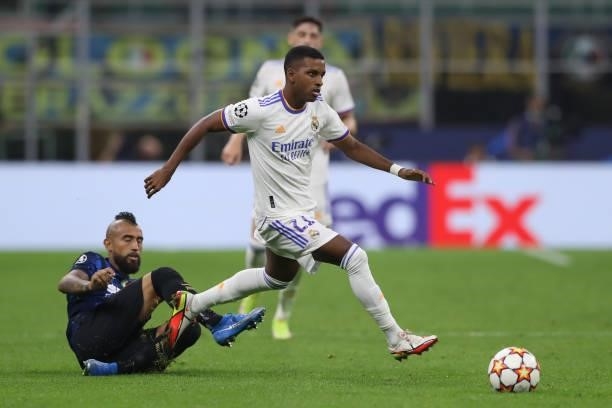 Rodrygo of Real Madrid skips over a challenge from Arturo Vidal of FC Internazionale during the UEFA Champions League group D match between Inter and...