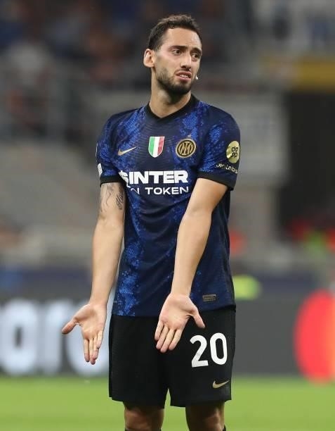 Hakan Calhanoglu of FC Internazionale reacts during the UEFA Champions League group D match between Inter and Real Madrid at Giuseppe Meazza Stadium...