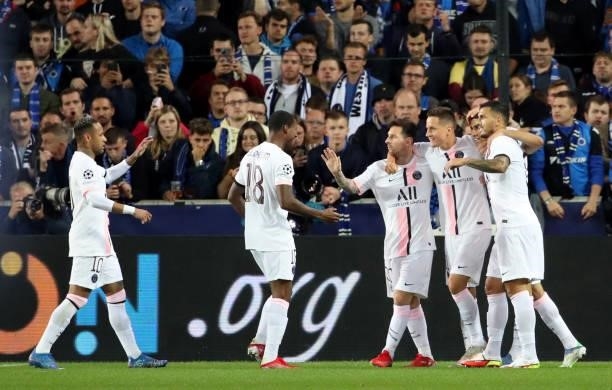 Ander Herrera of PSG celebrates with Lionel Messi of PSG after scoring the 0-1 goal during the UEFA Champions League group A match between Club...