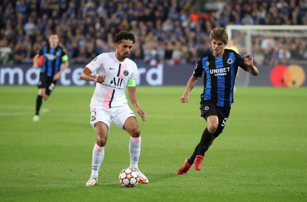 Marquinhos of PSG battles for the ball with Charles De Ketelaere of Club Brugge during the UEFA Champions League group A match between Club Brugge KV...