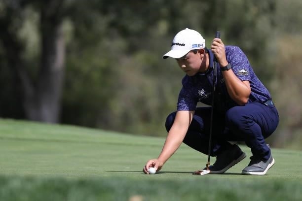 Dylan Wu lines up his putt on the ninth hole during round one of the Fortinet Championship at Silverado Resort and Spa on September 16, 2021 in Napa,...